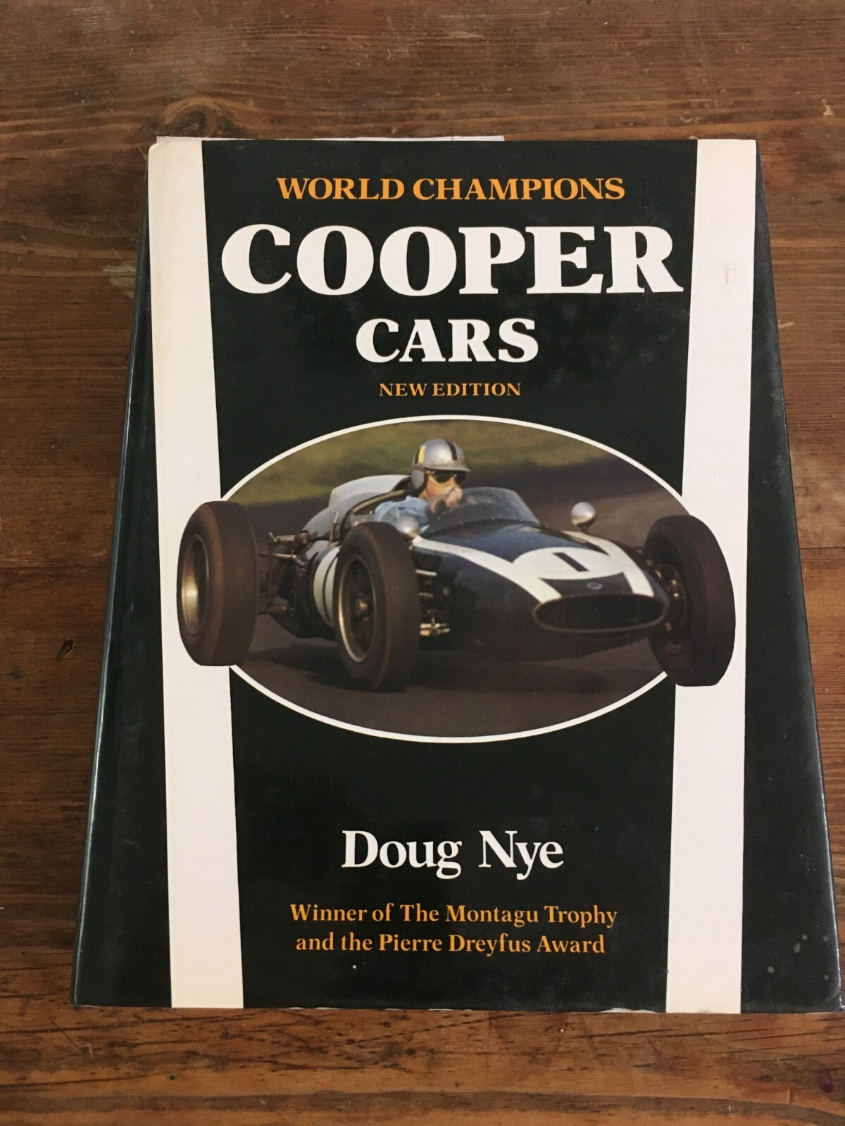 Cooper Cars by Doug Nye isbn 0-85045-828-5 Pristine copy.