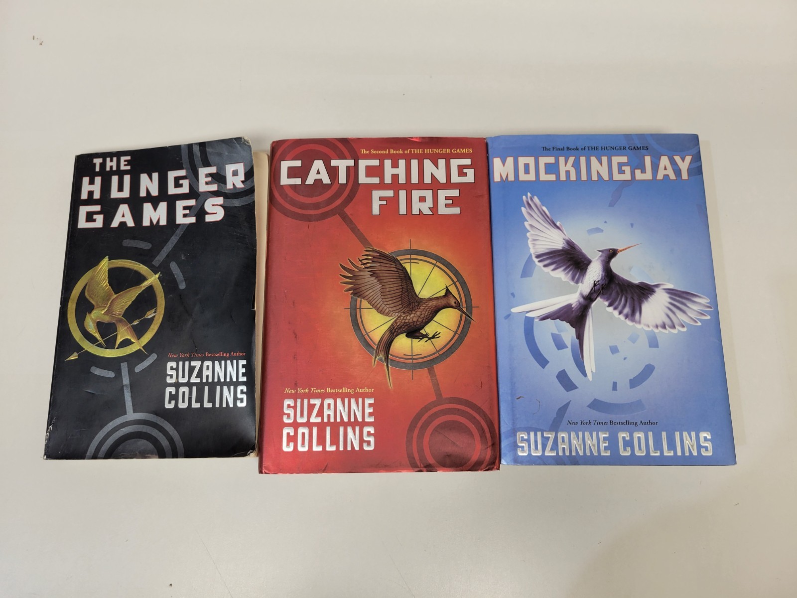 The Hunger Games Trilogy Book Set By Suzanne Collins Hardcover and Paperback Lot