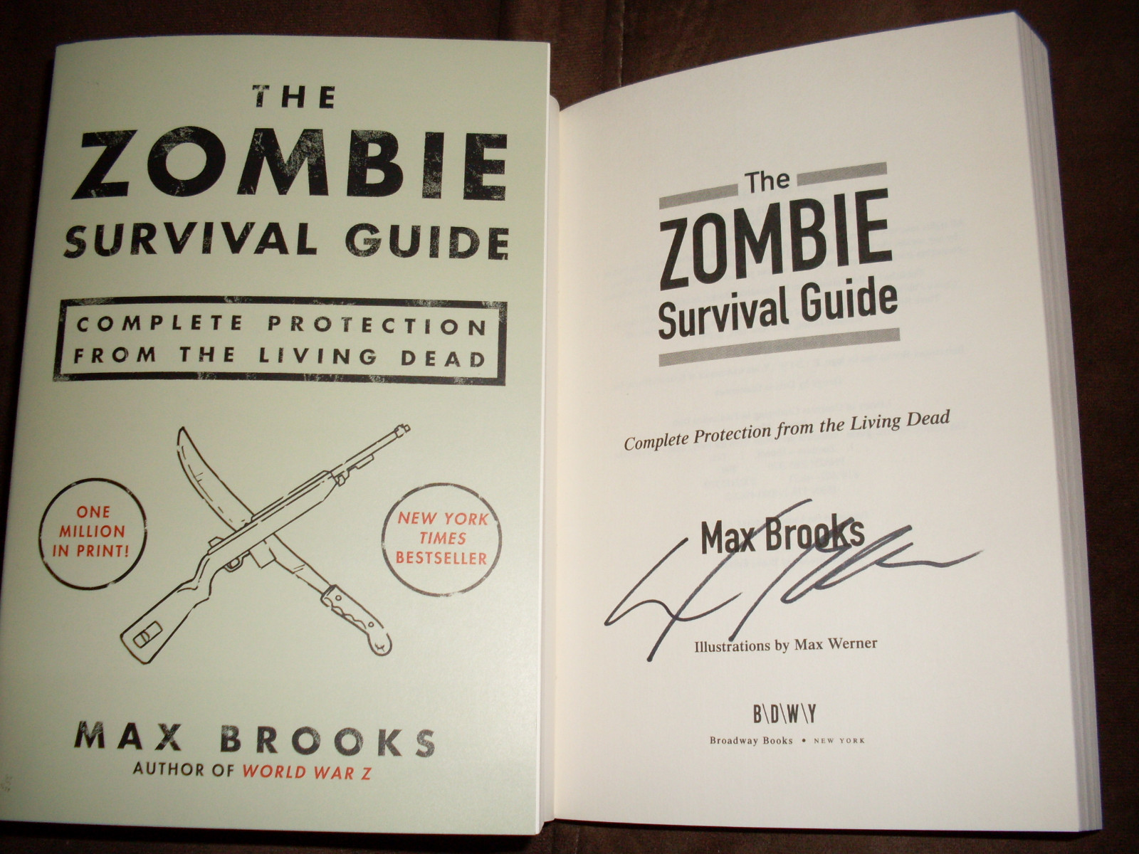 Max Brooks signed The Zombie Survival Guide 57th printing softcover boook