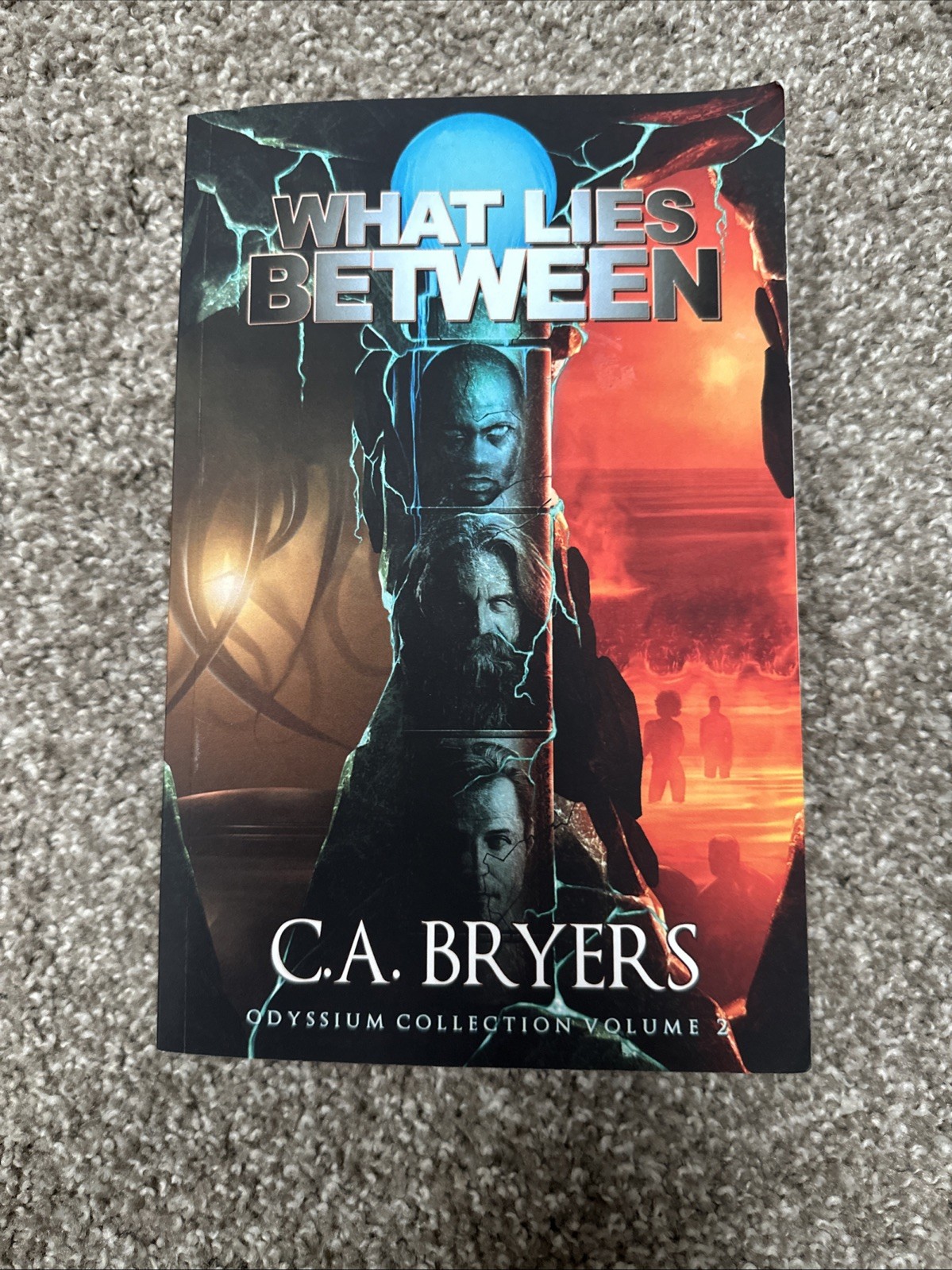 SIGNED COPY – What Lies Between: Odyssium Collection Volume 2