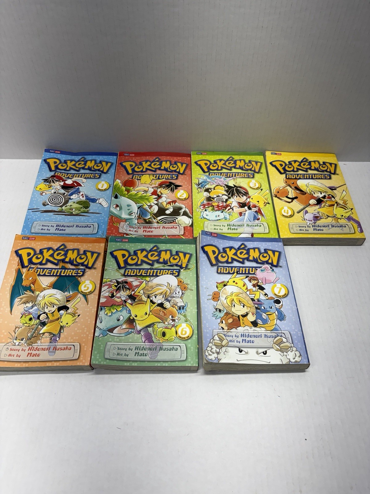 Pokemon adventures volumes 1-7 NICE USED
